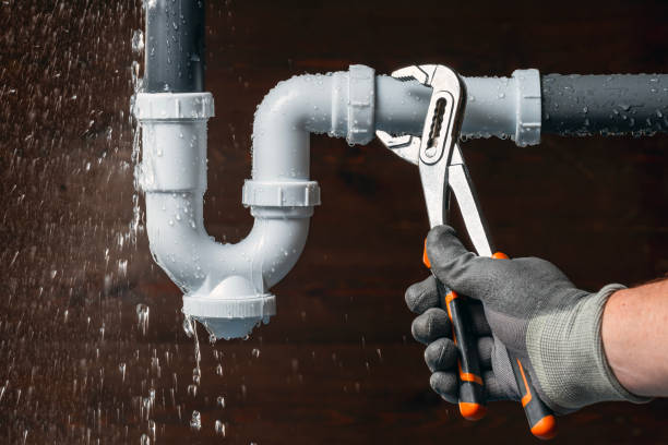 Professional Emergency Plumber technician working in Elmwood, MA